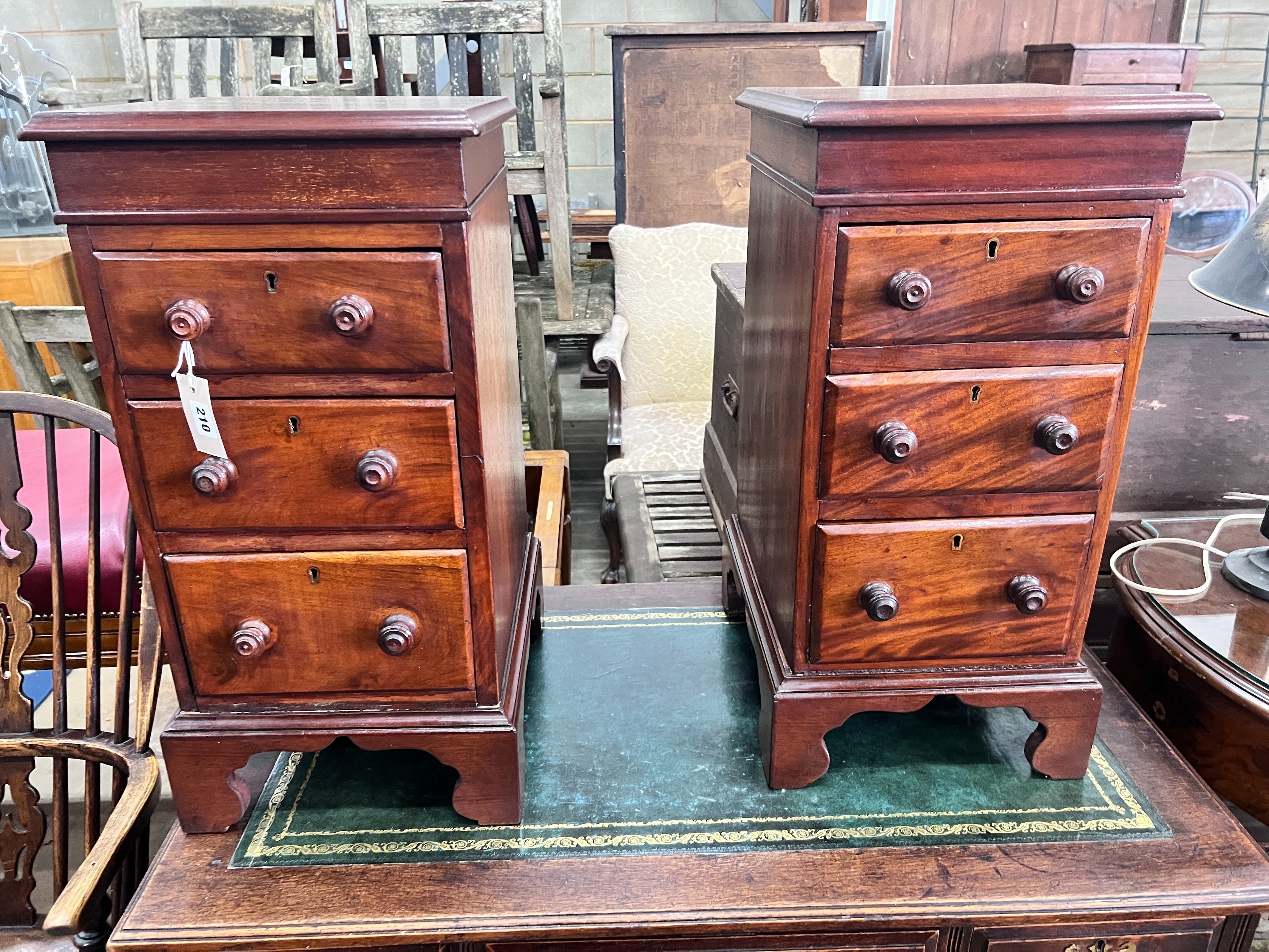 A pair of mahogany bedside chests (converted from desk pedestals), width 34cm, depth 39cm, height 67cm *Please note the sale commences at 9am.